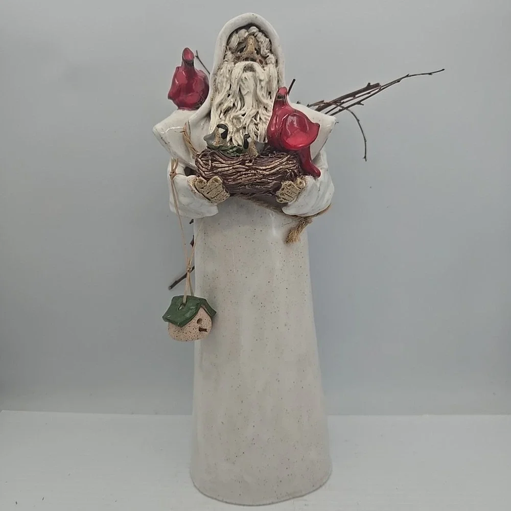 Tall White Coat Santa‎ Holding Cardinals And Bird Nest